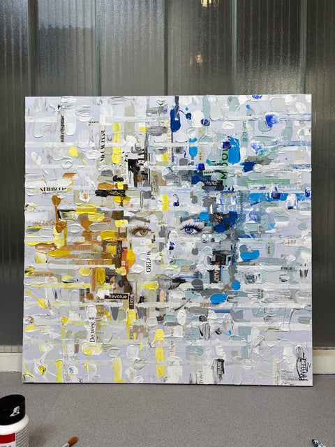 Frontal view of MIND III by Marjolein Marx, featuring bold grid-like strokes in white, grey, and blue with abstract facial elements emerging from beneath the texture. The piece balances structure and emotion in a contemporary, textural composition.