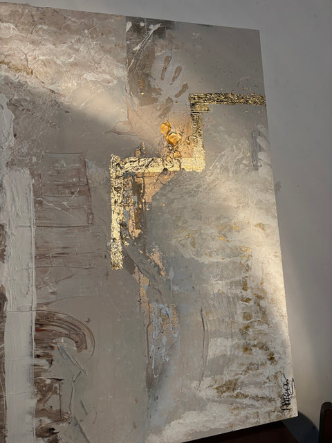 Angled view of “The BODY I” by Atelier Marx, illuminated by natural sunlight, highlighting the gold leaf zigzag, handprint texture, and layered materiality.