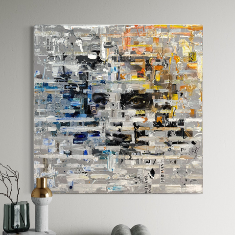 Room view of The MIND II by Marjolein Marx, displaying a textured portrait composed of bold collage fragments, layered brushstrokes, and contrasting sections in orange, blue, black, and white tones.